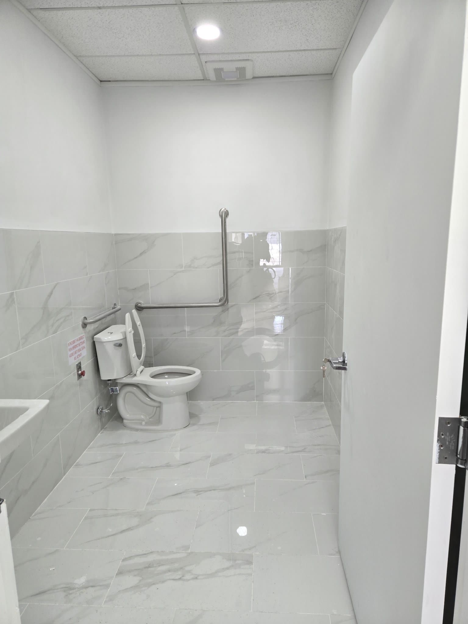 Commercial washroom with marble tile, Barrie Ontario