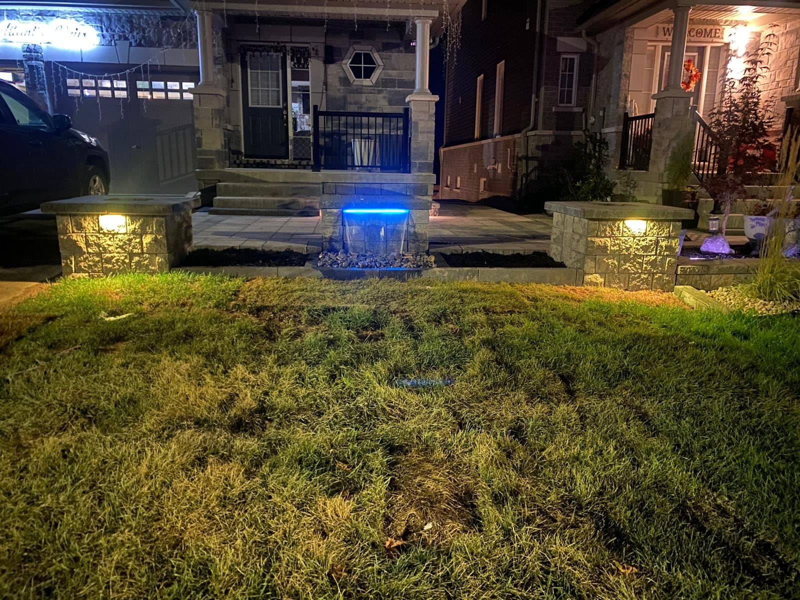 Front entrance landscape lighting in Barrie at night