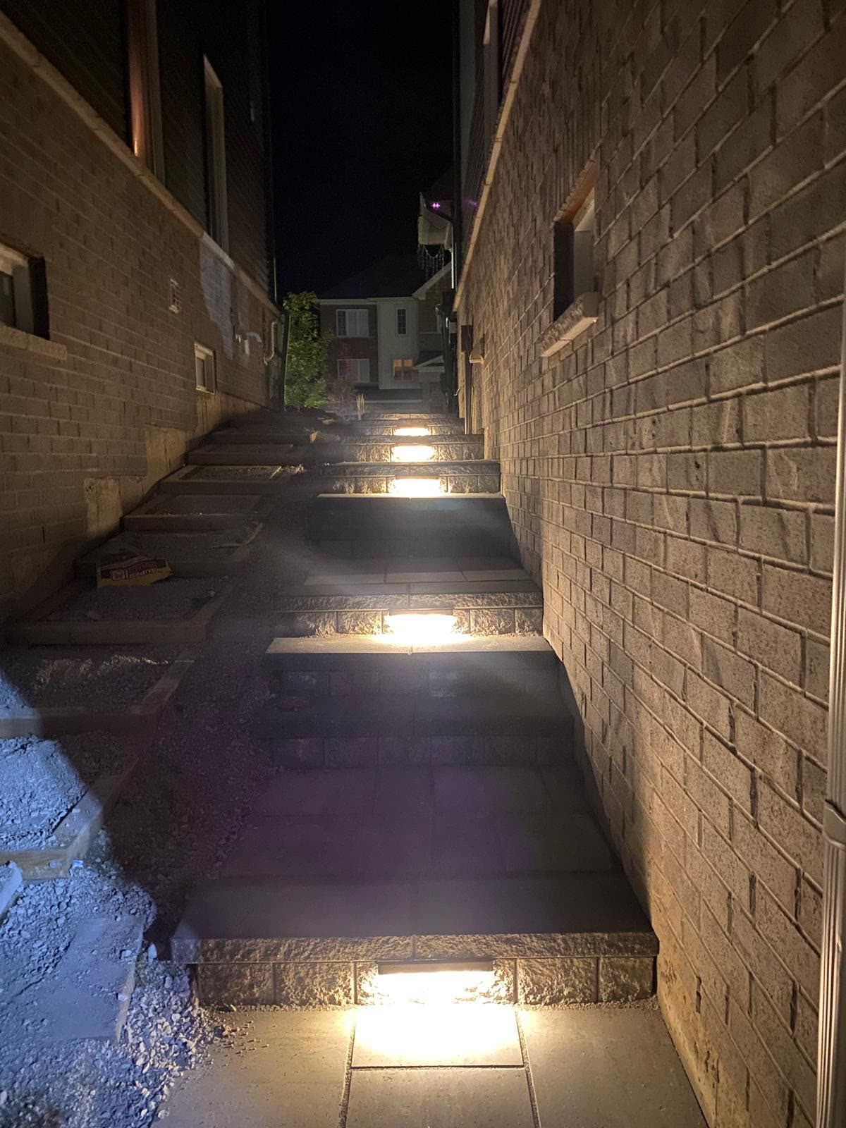 Illuminated natural stone steps with landscape lighting in Simcoe County