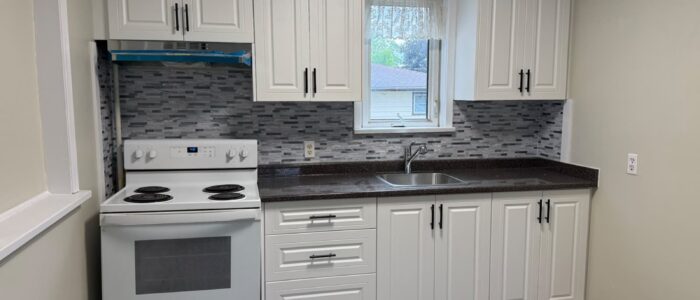 White kitchen with shaker cabinets and island, Barrie Ontario