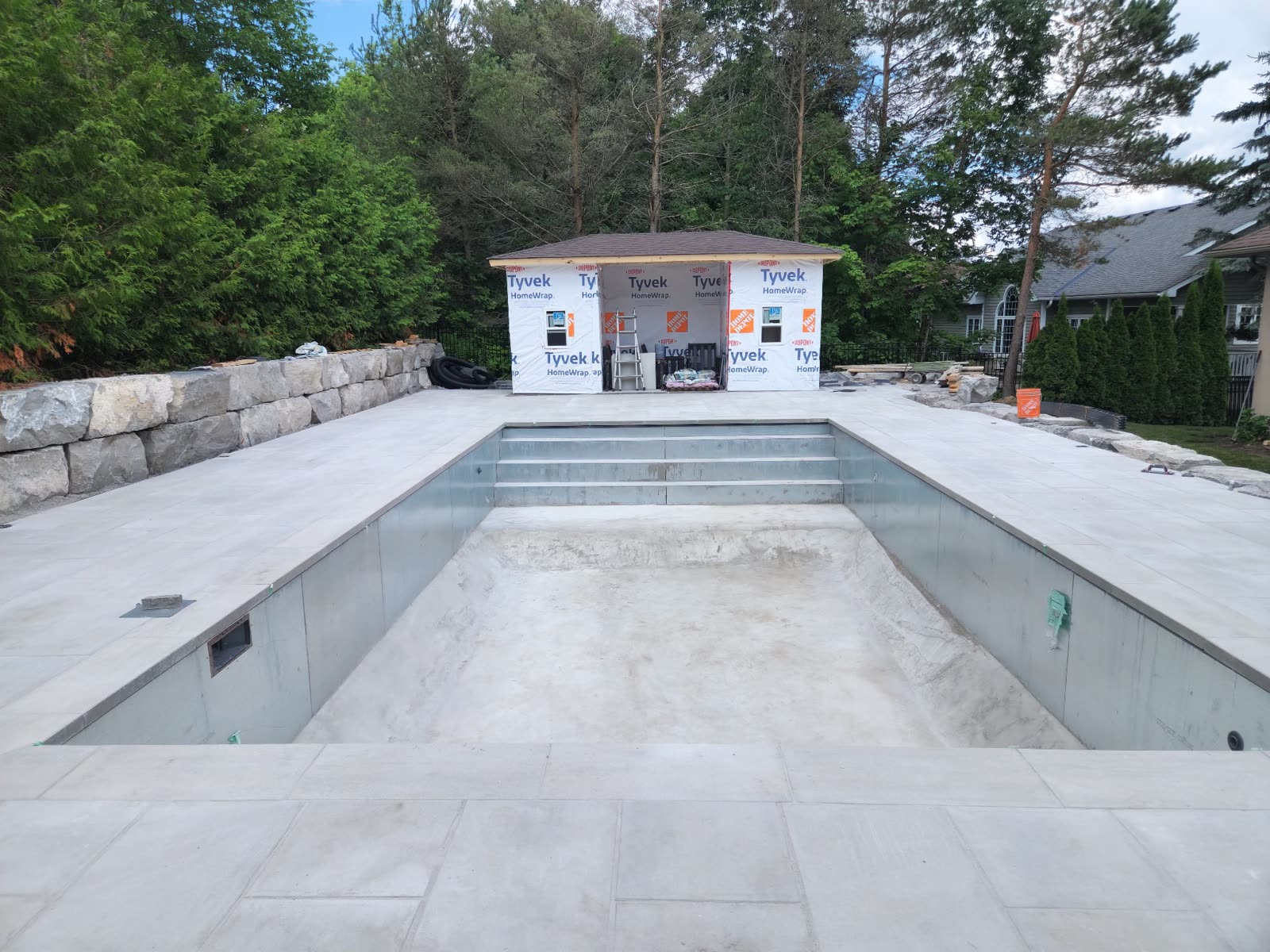 Swimming pool with armour stone coping, Barrie