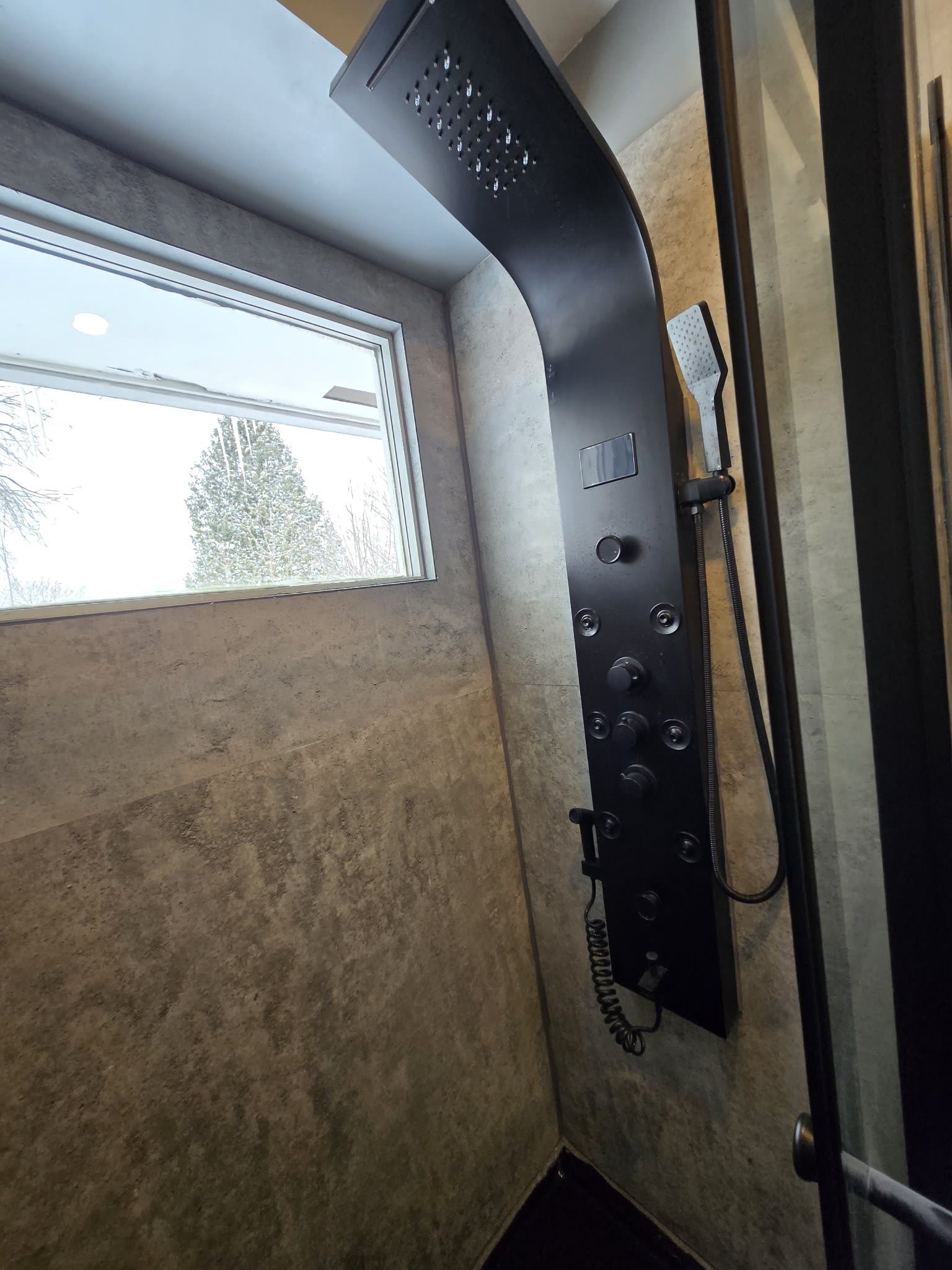 Black rain shower panel system with body jets, bathroom Barrie